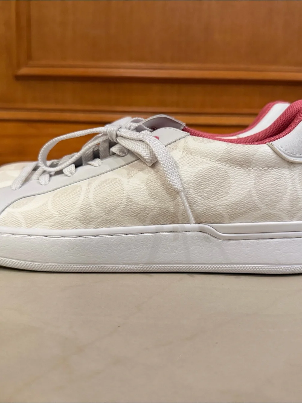 NWOT Coach White Low-Top Sneaker with Pink Interior Accents